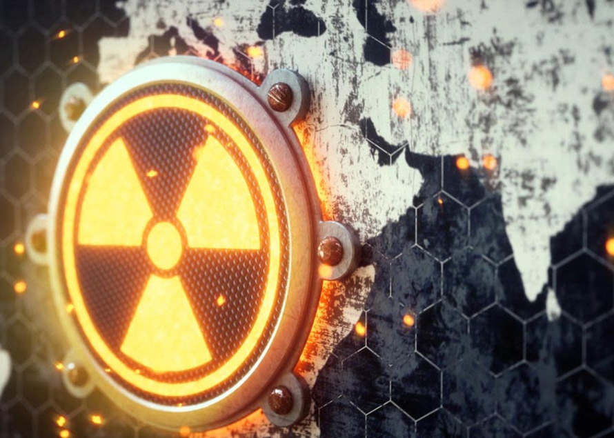 close up of a 3D render of a world map outline with a nuclear warning symbol attached.